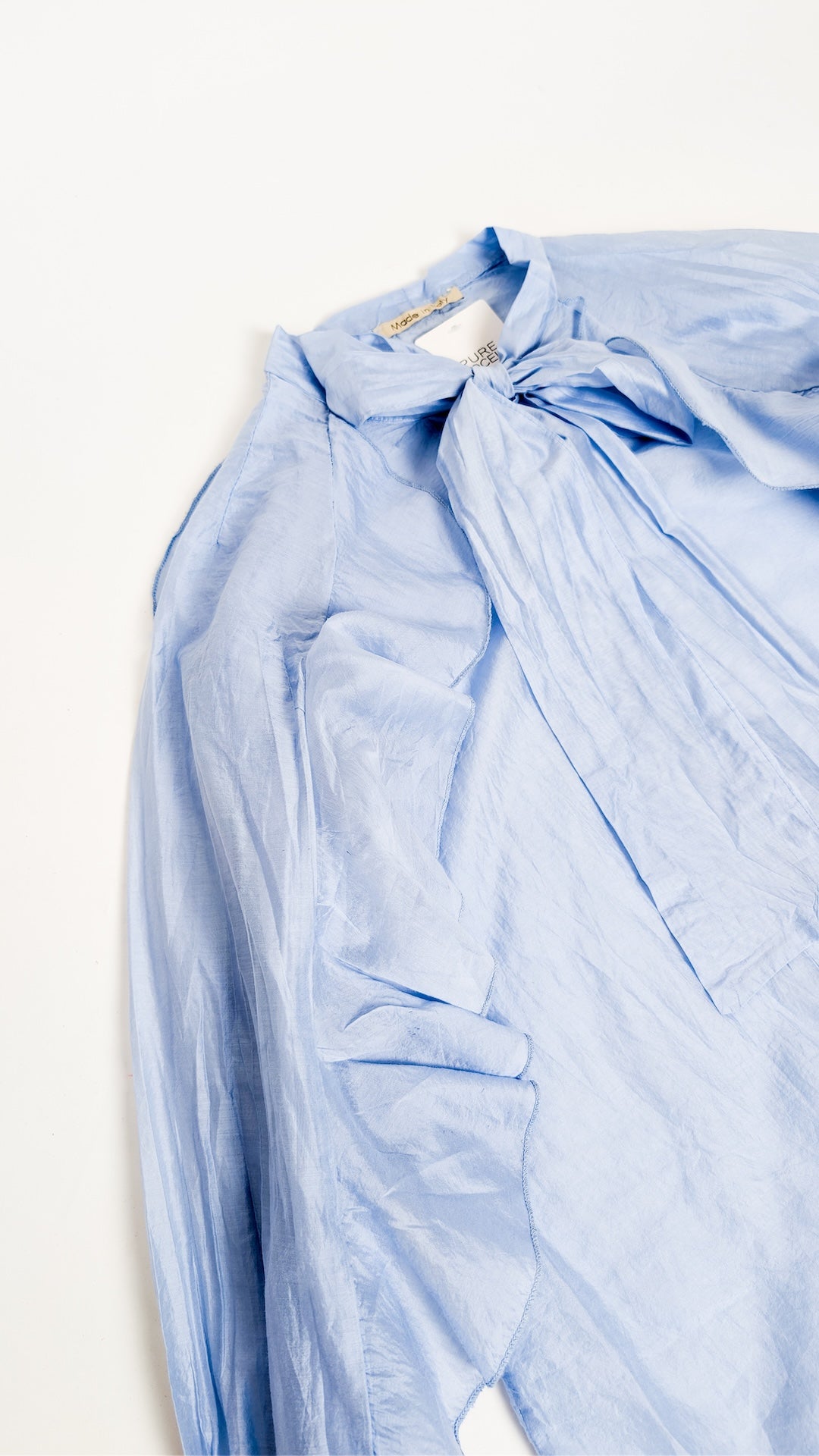 Srajica z zavezovanjem